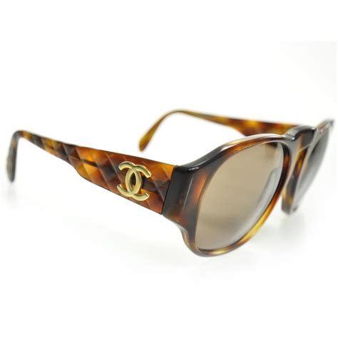 chanel tortoise shell glasses|Chanel quilted sunglasses case.